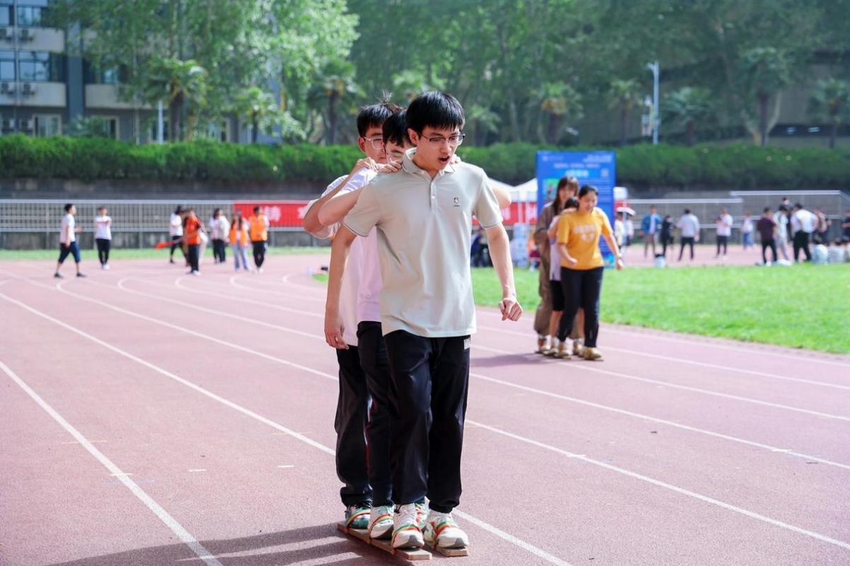 西安交通大学第四届少数民族传统体育运动会举行(图9)