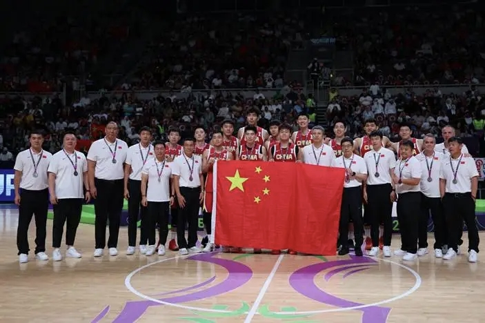 九游官网入口：“国家队级”师资赋能！泰山科技学院教师石昌华助力国家男篮斩获亚洲杯亚军(图1)